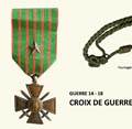 Croix de guerre française et fourragère aux couleurs de la croix de guerre.  -  Montage G. Brun.  